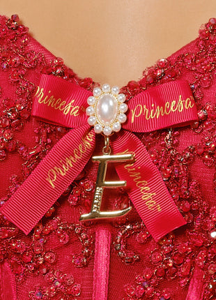 Lace-up corset ball gown w/ flowing layered skit & personalized letter brooch